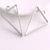 100 pièces Style Vintage Bronze argent alliage Triangle charmes colle creuse blanc pendentif plateau lunette charmes pour la fabrication de bijoux 39x25m253f