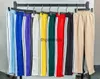 Diseñador para hombre sueltos hombres deportes pantalón largo cremallera basculador pantalones casuales pantalones de chándal joggers rayas laterales deporte ropa deportiva cordón angelcctv