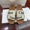 Designers Mulheres Sandálias Woody Famosas Mules Flat Slides Bege Branco Preto Rosa Lace Lettering Tecido Chinelos de Lona Mulheres Verão Sapatos Ao Ar Livre I4ak #