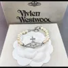 Designer Vivine Westwood Nouveau VivienneNewestwood 23 Western Empress Dowager Hollow Saturn Pearl Bracelet Womens French Classic Planet Cross Pearl Bracelet 59565