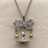 デザイナーViviene Westwoods New Viviennewestwood Dowager XIの3D Saturn Bow Bell Necklace Light Luxury Fashion Planet Necklace High Edition