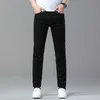 Mäns jeans designer jeans spring ny europeisk ljus lyx tunna smala passformar elastiska avslappnade byxor a5eb