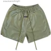 Shorts maschile estate dring a colore solido a secco rapido shorts intrecciato in nylon maschile e femminile sciolte a cinque punti L231212 L231212