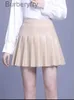 スカートリアルレザースカート女性2023秋冬新しい短いプリーツ韓国スタイルのスリムフィットハイウエストフリルブラックアプリコットスカート4xll231212