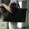 2017New Famous Trademark Black Shopping Waterproof Cloth Classic Travel Bag Ladies Casual Bottom Stitching Pu Bag Fashion Casual B211y