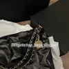 Totes Mülleimer Fashions Picknickdesigner Schulter echtes Leder Shopping Casual Bags Strand Luxurys Handtaschen Frauen Aufbewahrungswochenende Reisebag Kette Kette Geldbörse