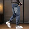 Jeans da uomo Jeans da uomo Pantaloni Harem Gamba larga Vestibilità ampia Tasche moda Desinger Pantaloni denim maschili affusolati Casual Streetwear Patchwork Q231213