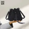 High-end gevoel nieuwe handtas windmolen knoop water emmer tas handgemaakte geweven tas niche ontwerp lichte luxe enkele schouder diagonale kruistas