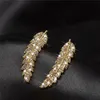 Boucles d'oreilles à clous pour femmes, bijoux délicats en forme de feuille de plume, couleur argent et or, cadeau quotidien de fête, à la mode, 259g