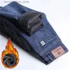 Jeans da uomo invernali di marca da uomo caldi jeans di peluche di alta qualità flanella di pelliccia spessa pantaloni slim elasticizzati 2023 pantaloni casual in pile maschile retrò denim Q231213