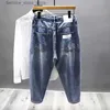 Mäns jeans 2023 Spring Autumn New Drawstring Jeans Men's Korean Fashion Slim avsmalnande draperade harembyxor Male Street Denim Pants Q231212