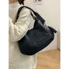 24SS Designer Westwoods Bag New Stage Relief Saturn Womens Bag Niche Designer Vintage Tassel Dark Single Counter Cross Womens B