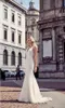 Ny ankomst En linje Bröllopsklänningar Deep V Neck -knappen Back Spetsapplikationer Brudklänningar med avtagbara kjolbröllopsklänningar