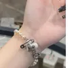 Diseñador Viviene Westwood Nuevo Viviennewestwood 23 Emperatriz occidental viuda Perla Amor Pins Pulseras Mujer Luz Lujo Pequeño y popular Saturno Melocotón Corazón Mano