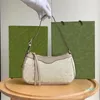 2024 Designer Bag Luxury Shoulder Temperament Armpit Bag Party Shopping för gåvor Must-Have Goodies Bag