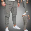 Męskie spodnie jesień mężczyźni spodnie Hip Hop Harem Joggers Pants 2020 Nowe spodnie Męskie Solid LTI-kieszeni Spodne