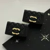 Lyxdesigner örhängen örat av hög kvalitet guldpläterad kopparkvinnor varumärke med stämpel väska form örhänge fest bröllop smycken voguish julklappar