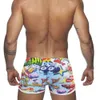 Nya män badkläder Summer Men Swimming Trunks Beach Sports Surf Trunks Cartoon Print med Pad Boy Men's Briefs Lossa fyrkantiga stammar