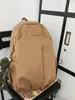 Sac à dos de marque de mode plissé pour hommes et femmes, cartable Simple et polyvalent pour Couple, sac d'ordinateur tactique