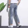 Jeans masculinos designer de luxo nove pontos jeans para marca de moda europeia masculina 2023 outono versátil impresso magro ajuste casual calças compridas heim