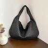 Bolsas de hombro Bolsa tejida Francés de gama alta Atmosférico Versátil One Underarm Nicho Textura Viajes portátiles