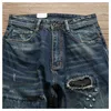 Mäns jeansdesigner jeans trendiga nödställda patch jeans, mäns lösa raka avslappnade byxor, kattviskare, stenslipning, tvättad och sliten långa byxor kkk7