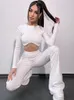 Kvinnors tvåbitar byxor Rhinestone Crop Topps Tracksuit Women Casual Slim Long Sleeve Top High midje Flare Pant 2 Set Female 2023 Spring