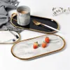 Gold-plated oval ceramic marble tray food fruit storage jewelry main plate dessert plate decoration metal party plate tableware Y1251N