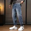 Jeans da uomo Jeans da uomo Pantaloni Harem Gamba larga Vestibilità ampia Tasche moda Desinger Pantaloni denim maschili affusolati Casual Streetwear Patchwork Q231213