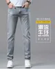 Jeans pour hommes Jeans de marque Hommes d'été Slim Fit polyvalent petite jambe droite marque de mode européenne à la mode décontracté gris clair pantalons longs 8BXQ