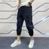 Herr jeans japanska trend nya mäns rippade hål jeans vit grön svart fotled längd ungdom mode lös denim harem lastbyxor q231213