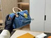 Umhängetaschen Damentaschen Handtasche Frau Baguette große Kapazität Tragetaschen Designer importiertes Rindsleder Clamshell-Taschenstilvolle Taschen