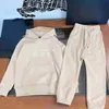 clothes New Hooded pullover set for baby Letter kids Tracksuits Size 100-150 CM Long sleeved sweater and lace up pants