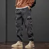 Pantaloni da uomo di marca Abbigliamento invernale in pile caldo velluto a coste da uomo Cargo Work Thick Baggy Streetwear Jogging Pantaloni da uomo di grandi dimensioni 5XL 231212