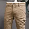 Męskie dżinsy projektant mody mężczyźni Khaki splatane rozciąganie szczupłe spodni ładunkowy dżins