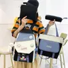 Mochila kawaii 4 peças conjunto moda feminina tendência crachá saco de escola de lona para meninas bonito pingente contraste cor ombro