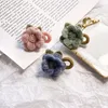 Accessori per capelli 10 pezzi/lotto fiori di lana in feltro con retro piatto da 4,0 cm per fai da te con lecca-lecca al centro