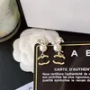 18 -karatowe kolczyki z złotym znaczkiem defiing kobiety miłosne kolczyki vintage miłosne biżuteria projekt dla kobiet w Europie luksusowe przyjęcie ślubne COUM265Z