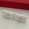 Pendientes de diseño de lujo Stud Stud Alta calidad Chapado en oro Cobre Mujeres Marca Letra con sello Bolsa Forma Pendiente Fiesta Joyería de boda Voguish Regalos de Navidad