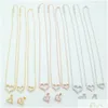 Bijoux de créateurs Femmes Diamant Coeur Pendentif Colliers Boucles d'oreilles en or rose Costumes Ne se décolore jamais en acier inoxydable 3 couleurs Dhhjm