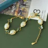 Ancient Inclaid Natural Hotan Jade White Jade Lucky Grass Dolphin Moda Fashion Clover Bracelete Feminino Pulseira de Design Hollow