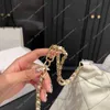Sacos Designer Bag Ombro Preto Branco Bolsas De Couro Mochila Genuine Luxurys Mulheres Gold Drawstring Chain Moda Bolsa Compras Viagem para Meninas