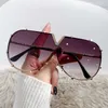 Otoño e invierno nuevas gafas de sol con montura metálica integradas a la moda V gafas de sol con montura grande 1214 1214