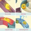 Bath Toys Baby Bath Toys DIY Blocks Slide Race Run Assembling Orbit Yellow Ducks Slide Bathroom Bathtub Kids Play Water Game Toy Set Q231212