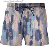 Mäns shorts 2021 sommar Nya casual strandshorts 3D graffiti mönster herrstrandbyxor lösa sport snabbtorkande simning mäns brädshorts l231212