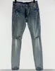 Męskie purpurowe dżinsowe projektanci Jean Hombre spodnie Mężczyźni haft patchwork Ripped Brand Motorcycle Spodni męskie rozryte dla trendów vintage spodni