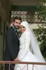 イスラム教徒のウェディングドレスは、Mhamad Lace Winter Bridal Gowns Long Neck Arabic Islamic Aラインのウェディングドレスを言った