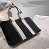 Top Bolsos de mujer WOODY Tote bolso de compras bolso de lona de alta calidad moda lino Grandes bolsos de playa diseñador de lujo viaje Cross2165