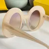 Sonnenbrille hochwertige kreisförmige Mode -Landebahn -Sonnenbrille für Männer und Frauen mit gebogenem Blatt HipHop -Stil und Metallbuchstaben Symbol Dekoration auf Tempeln 4008
