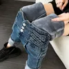 Женские джинсы Модные шерстяные ультратонкие джинсы с высокой талией женские эластичные узкие брюки-карандаш толстые плюшевые горизонтальные джинсовые брюки уличная одежда 231213